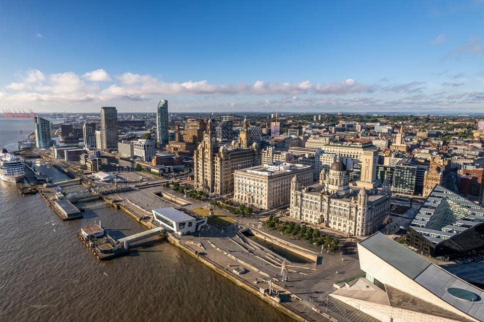 The drone aerial view of the cruise terminal and city of Liverpool in England.