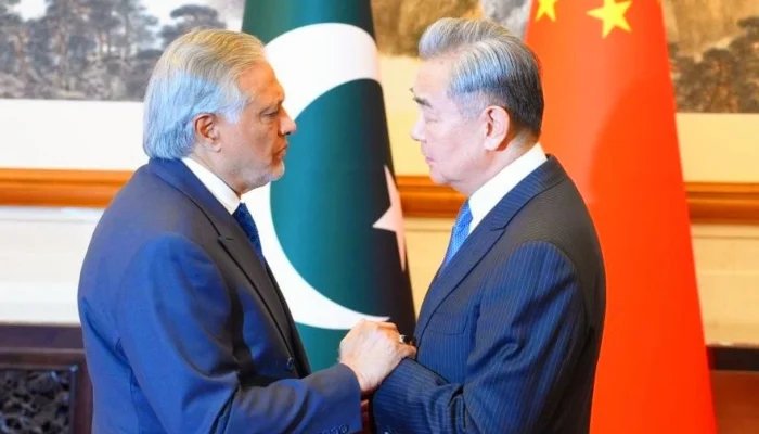 China’s Foreign Minister Wang Yi (right) receives Deputy Prime Minister and Foreign Minister Ishaq Dar upon arrival at the Diaoyutai State Guest House in Beijing, China, March 31, 2026. — X/@ForeignOfficePk