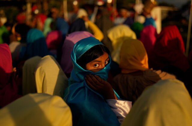 A devotee dressed as a townsperson takes part in a Way of the Cross reenactment in Arraijan, Panama, Good Friday, April 3, 2026. (AP Photo/Matias Delacroix)