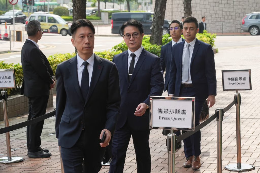 Michael Yung, an assistant director of the Fire Services Department, arrives at City Gallery in Central to give his testimony on Wednesday. Photo: Sun Yeung