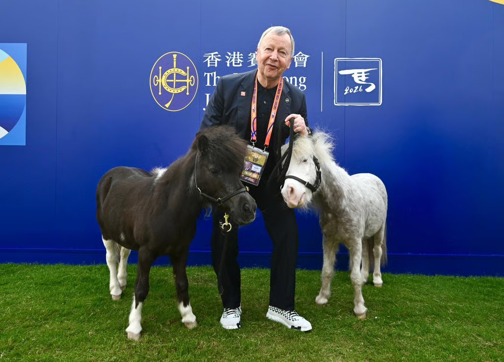 Club Chief Executive Officer Winfried Engelbrecht-Bresges at Jockey Club booth with  Shetland ponies.