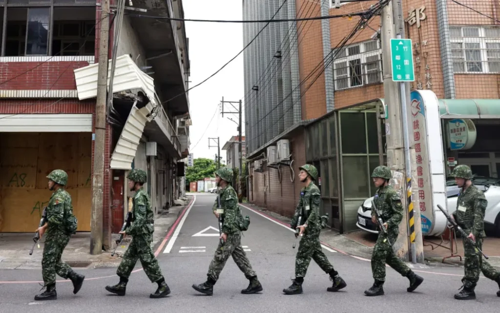 Soldiers march along a street during the Han Kuang military exercise in Taoyuan, Taiwan, on July 26, 2023.