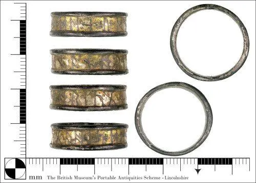 Close up images of the ring, with ruler markings around the perimeter.
