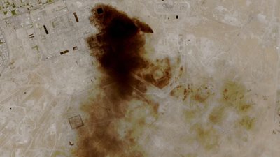 A satellite view of smoke billowing at a Saudi Aramco oil facility after a reported attack by Iranian drones (via REUTERS)