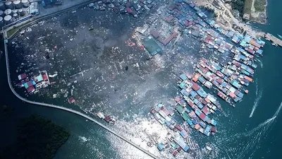 This handout photo taken and released by Malaysia's Sandakan Fire and Rescue Department on April 19, 2026, shows a general view of the Kampung Bahagia water village after a fire, in Sandakan. (AFP)
