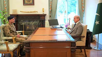 Pakistan's Prime Minister Shehbaz Sharif (R) speaking with Army Chief and Field Marshal Asim Munir at the Prime Minister's House in Islamabad. (AFP)