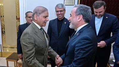 Pakistan Prime Minister Shehbaz Sharif, left, greets Iran's Foreign Minister Abbas Araghchi before their meeting in Islamabad, Pakistan, Saturday, April 25, 2026. (AP)