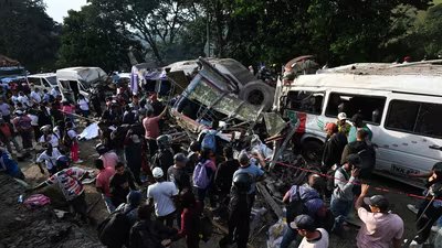 People remain at the site of an explosion after a bomb attack at El Tunel, on the Popayan-Cali road, in Cajibio, Cauca department, Colombia, on April 25, 2026. (AFP)