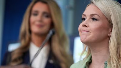 White House press secretary Karoline Leavitt smiles as Small Business Administration Chief Kelly Loeffler looks on during a news conference in the James Brady Press Briefing Room at the White House, Wednesday, April 15, 2026, in Washington. (AP)