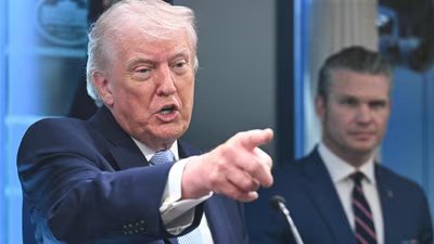 US President Donald Trump, alongside Secretary of Defense Pete Hegseth, speaks about the conflict in Iran in the James S. Brady Press Briefing Room of the White House on April 6, 2026, in Washington, DC. (AFP)