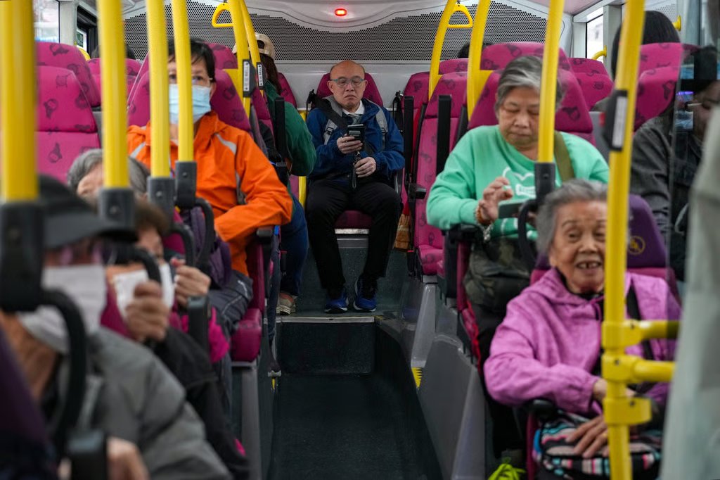 Passengers on a double-decker bus in Sham Shui Po on January 25. Photo: Sam Tsang