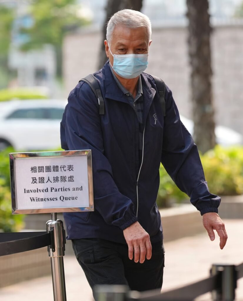 Law Kwok-shui, an electrician of ISS EastPoint, heads into the hearing. Photo: Karma Lo