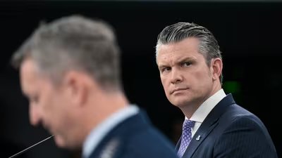 Secretary of Defense Pete Hegseth, right, said the Pentagon’s goal is to destroy Iran’s missiles, drones and navy.