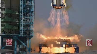 A Chinese Long March-2F carrier rocket lifts off.
