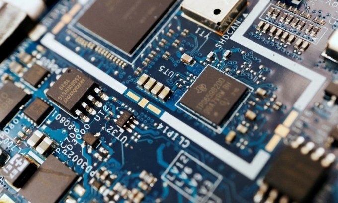 Semiconductor chips are seen on a circuit board of a computer in this illustration picture taken Feb. 25, 2022. Photo by Reuters