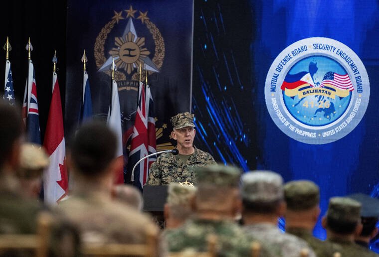 REUTERS/NOEL CELIS
                                I Marine Expeditionary Force Commanding General and U.S. Marine Corps Lieutenant General Christian Wortman speaks during the opening ceremony of the U.S.-Philippines Balikatan joint military exercises at Camp Aguinaldo in Quezon City, Metro Manila, Philippines, on Monday.