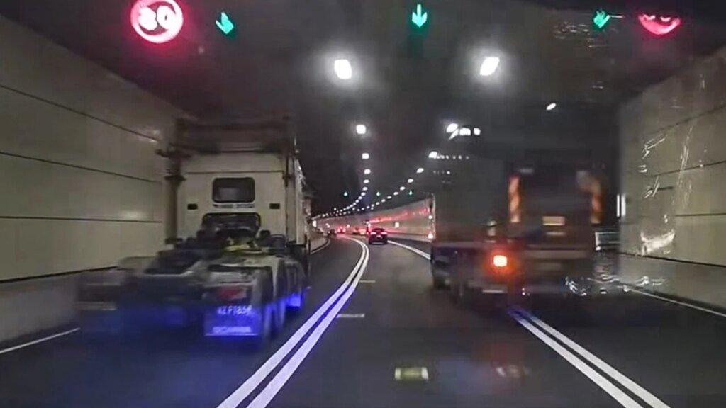 Hong Kong police arrest 2 drivers over alleged truck racing viral video