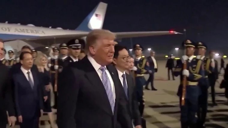 Trump arrives in China for high-stakes summit