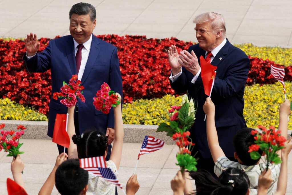 Chinese President Xi Jinping and U.S. President Donald Trump attend a welcome ceremony at the Great Hall of the People on Thursday in Beijing. Credit: Alex Wong/Getty Images