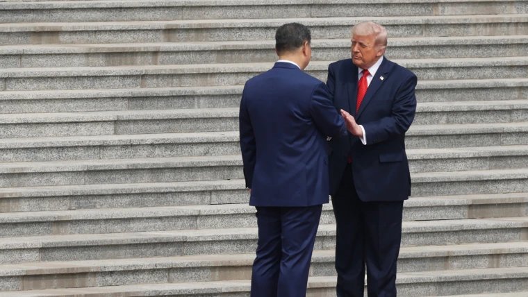 Trump shakes hands with Xi at start of historic U.S.-China summit