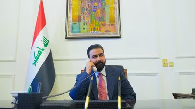 New Iraqi Prime Minister designate Ali al-Zaidi, uses a phone at his office in Baghdad. (via REUTERS)