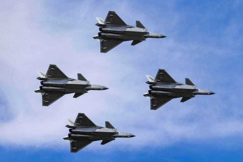 J-20 stealth fighter jets perform in the sky during the 2025 aviation open-day activities of the Chinese People's Liberation Army (PLA) Air Force and the Changchun Air Show on September 19, 2025 in Changchun, Jilin Province of China.