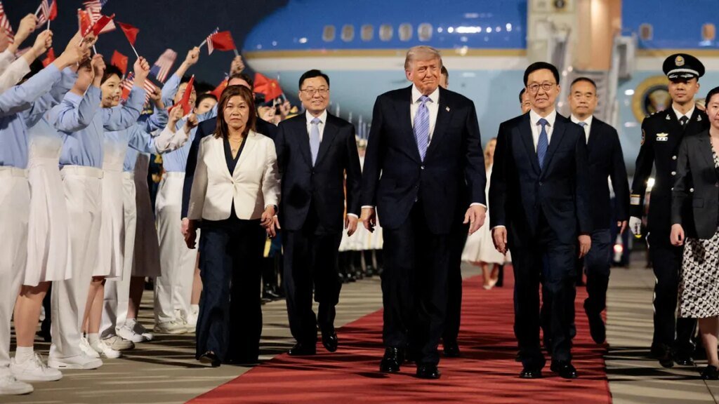 Trump with chinese vice president as he arrives in china
