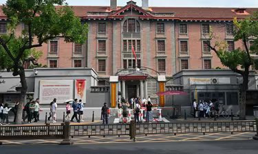 The Chinese national flag is pictured at half mast to mourn the death of China's former premier Zhu Rongji at the Red Building of Peking University, the site of early Chinese Communist Party revolutionary activities, in Beijing on August 18, 2026. (AFP FILE)