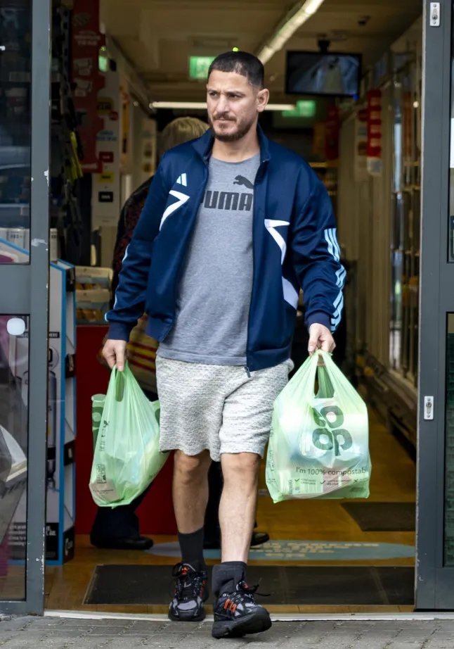 Mohammed Yaseen, visiting a Co-op store near his bail hostel in Old Windsor. Yaseen has a criminal past in Germany and is applying for asylum in UK despite known ISIS connections in his past.